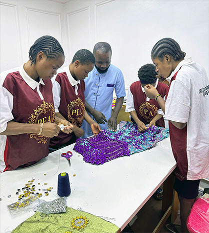 How One Nigerian Organization Is Turning Unemployed Youth Into Luxury Fashion Artisans